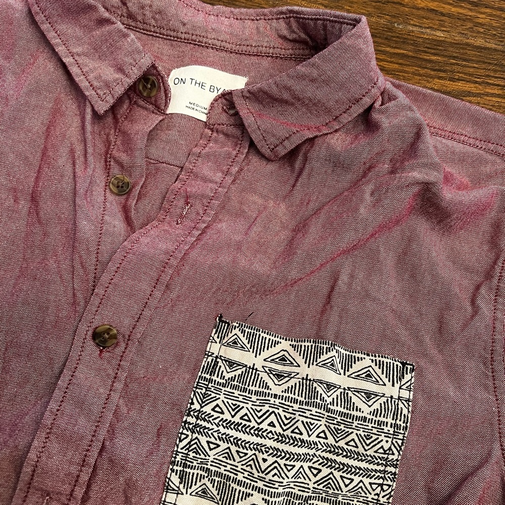 On the byas size medium button up